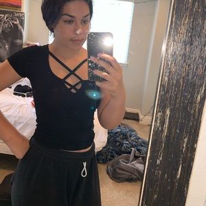 black t-shirt with cross cross in the front